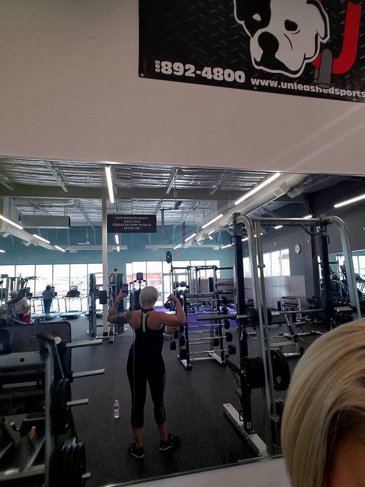 Unleashed banner hanging over a local gym floor
