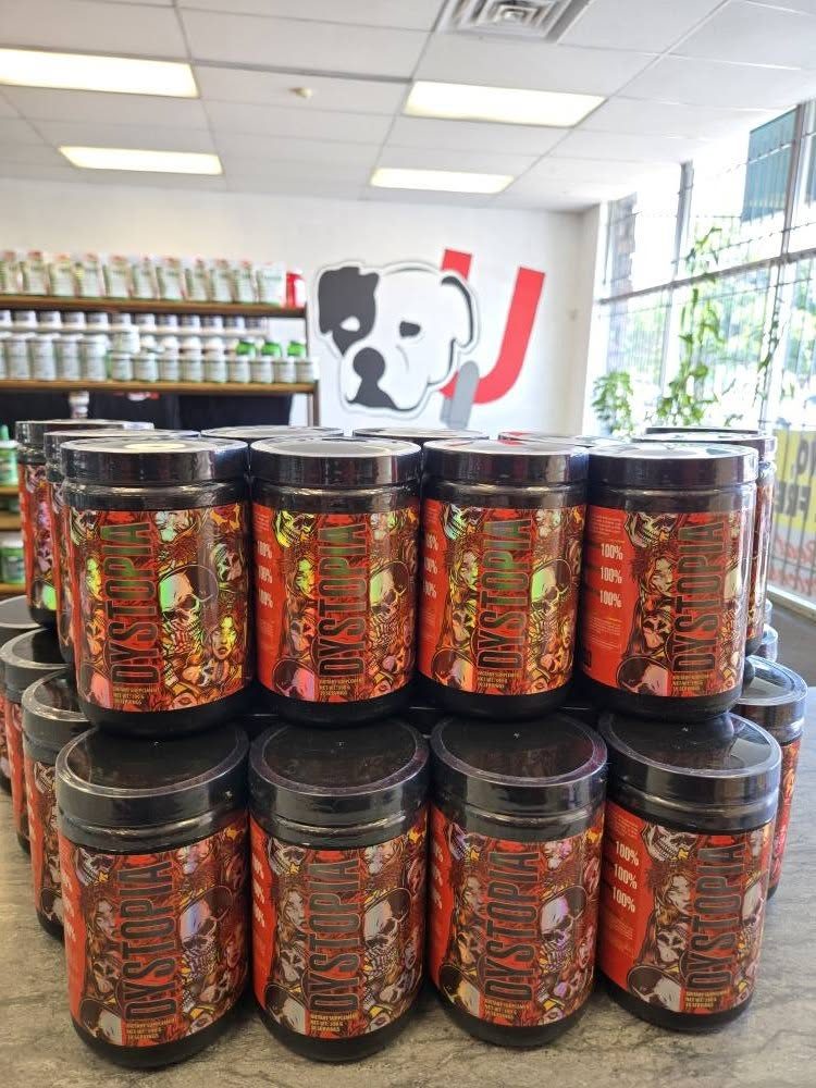 Product stacked in front of the Unleashed logo wall