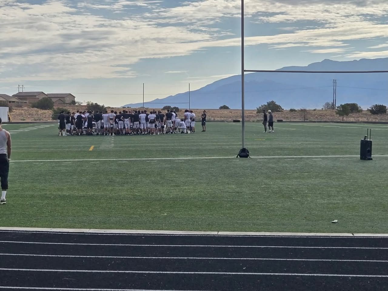 Sponsored high school team on the practice field